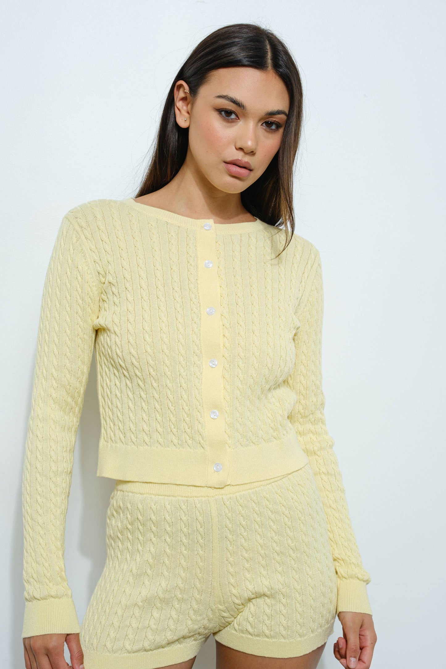 CABLE KNIT CARDIGAN: